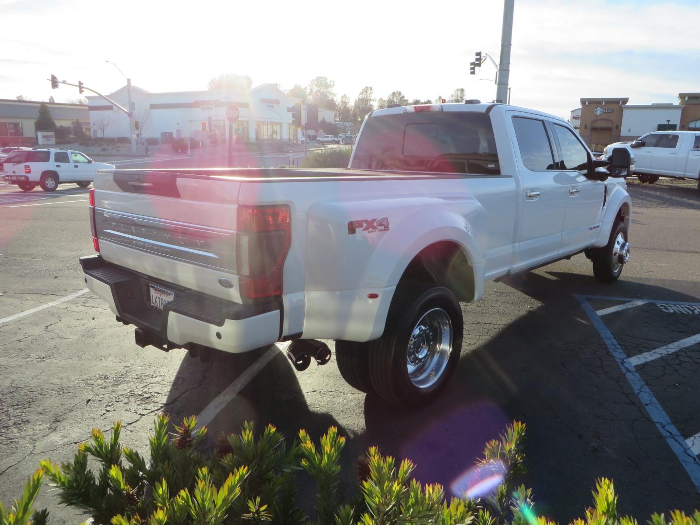 2020 White /BLACK Ford F-450 SD PlatinumCrew Cab DRW 4WD (1FT8W4DT4LE) with an 6.7L V8 OHV 16V DIESEL engine, 6A transmission, located at 2630 Grass Valley Highway, Auburn, CA, 95603, (530) 508-5100, 38.937893, -121.095482 - Must see F450 with a tool box refueling station, window tint, and a center console vault. - Photo#4